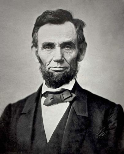 a still shot of abraham lincoln posing for a photograph. 