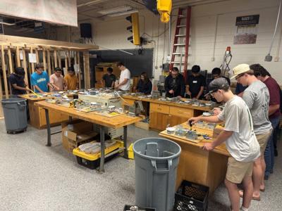 Students working on projects in a classroom. 