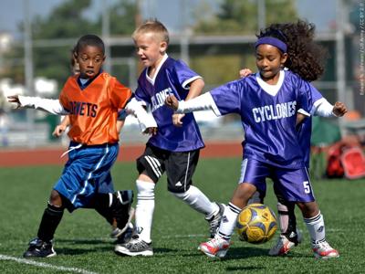 Kids playing soccer