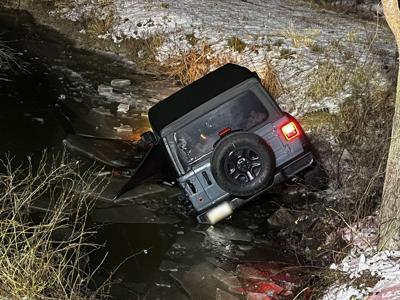 Jeep in Creek