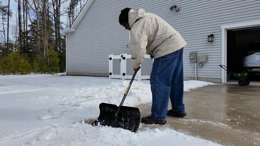 Al Miller shoveling
