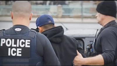 ICE agents make an arrest. (File photo)