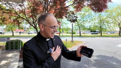 Father Lewis, Pastor of St, Jude's The Apostle Church in Lewes watching the new Pope