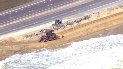 Workers repairing the North Indian River Inlet Beach
