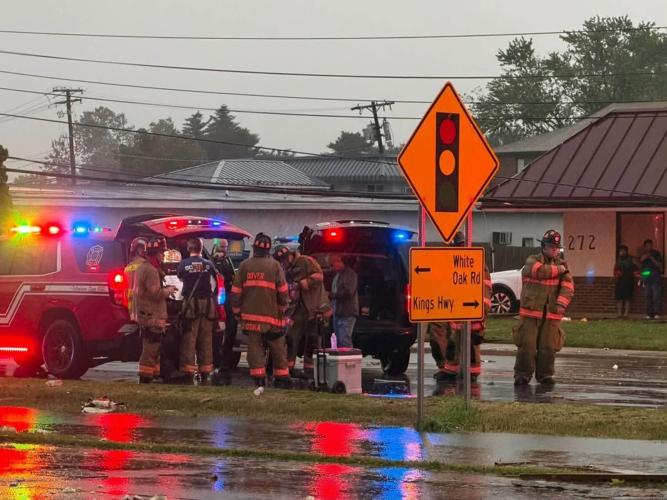 First responders standing on Route 13.