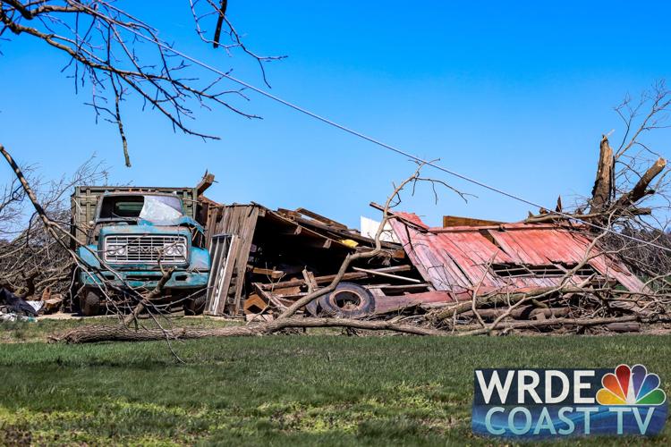 The windshield of a vehicle was ruined along with the building it was parked next to.