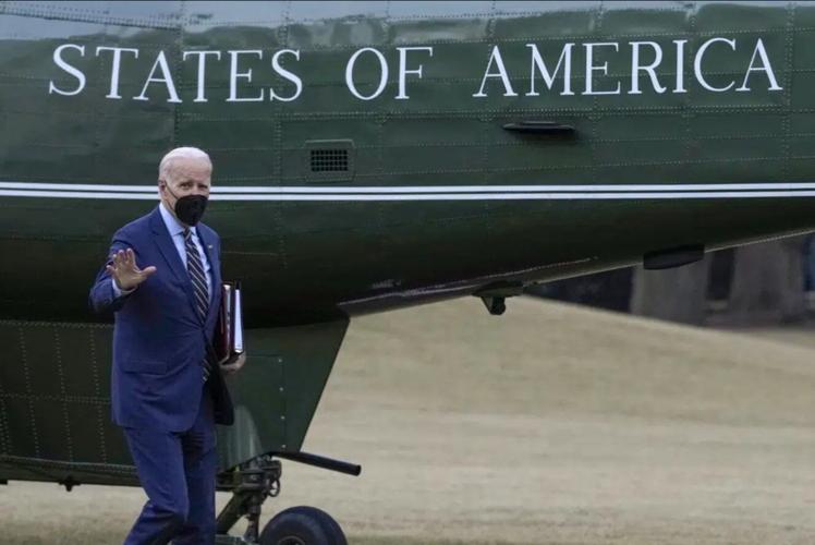 President Joe Biden walks from Marine One towards the Oval Office on the South Lawn of the White House in Washington, Wednesday, Jan. 11, 2023, after returning from Walter Reed National Military Medical Center where first lady Jill Biden had surgery to ...