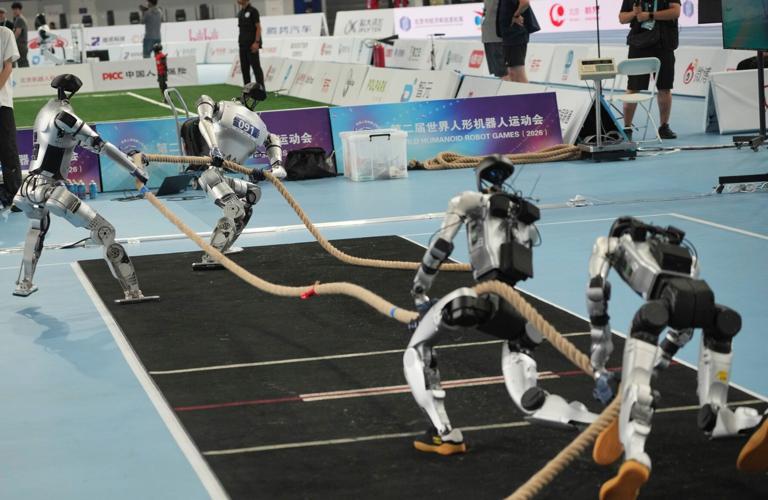 Humanoid robots sprint, play soccer and set records at Beijing games, in photos