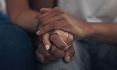supportive hand holding 