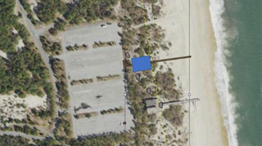 The blue square shows where the building was first planned to go