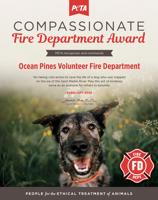 Ocean Pines Volunteer Fire Department receiving award from PETA after rescuing dog