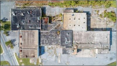Building to be demolished near Heron Park