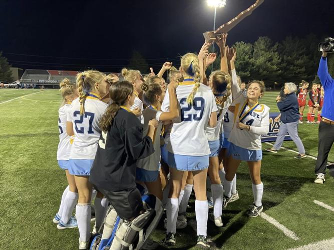 The Vikings Raising the trophy for the second straight time