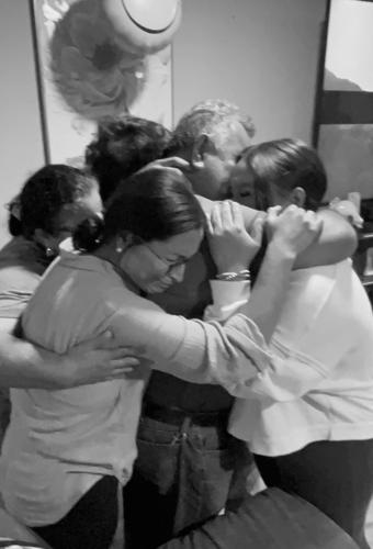 Pastor Daniel Fuentes Espinal is reunited with his family. (Clarissa Cordero)