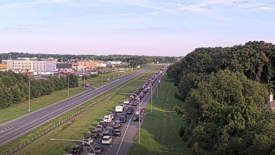 The northbound lane of DE Route 1 in Milford with cars in both directions being forced into a turnoff. The southbound lane is relatively clear of traffic.