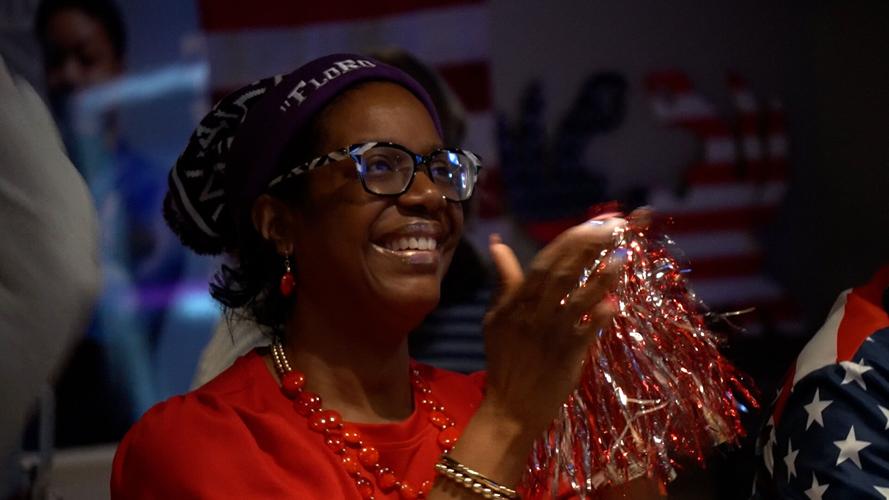 Nicole Ro watching her daughter compete