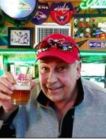 A picture of Steve at the Original Greene Turtle with a beer