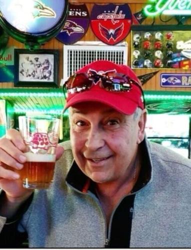 A picture of Steve at the Original Greene Turtle with a beer
