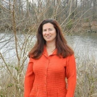 Women in red jacket with brown hair