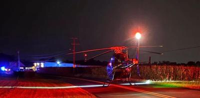 an image of a helicopter landing to pick up a patient 