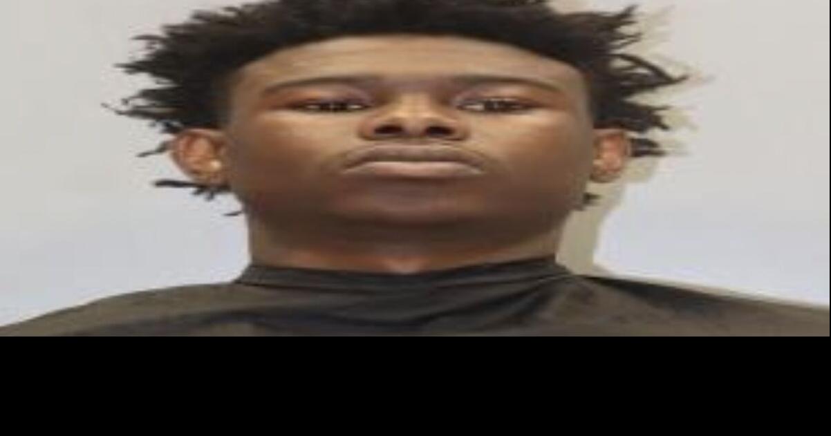 Man arrested and charged with robbery after barricading himself in ...