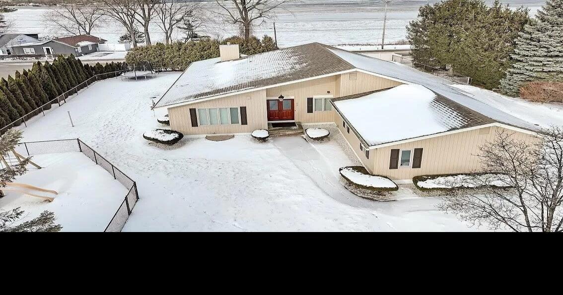 This 1.1 million home has a stunning master suite and overlooks