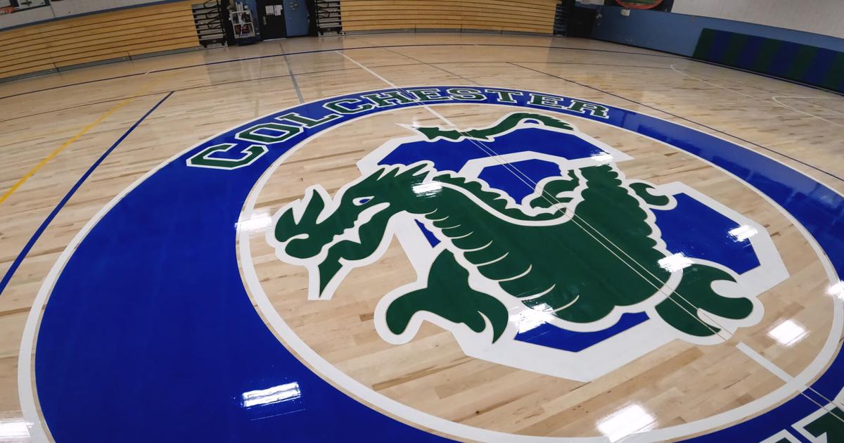 New gym floor with shock absorption installed at Colchester High School by 1976 alumni