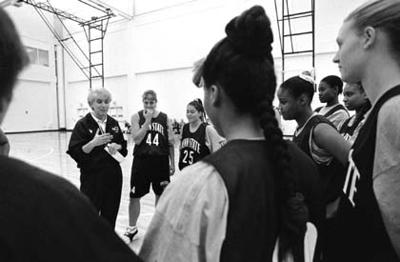 First Practice Coach Rene Portland Talks To The Team During