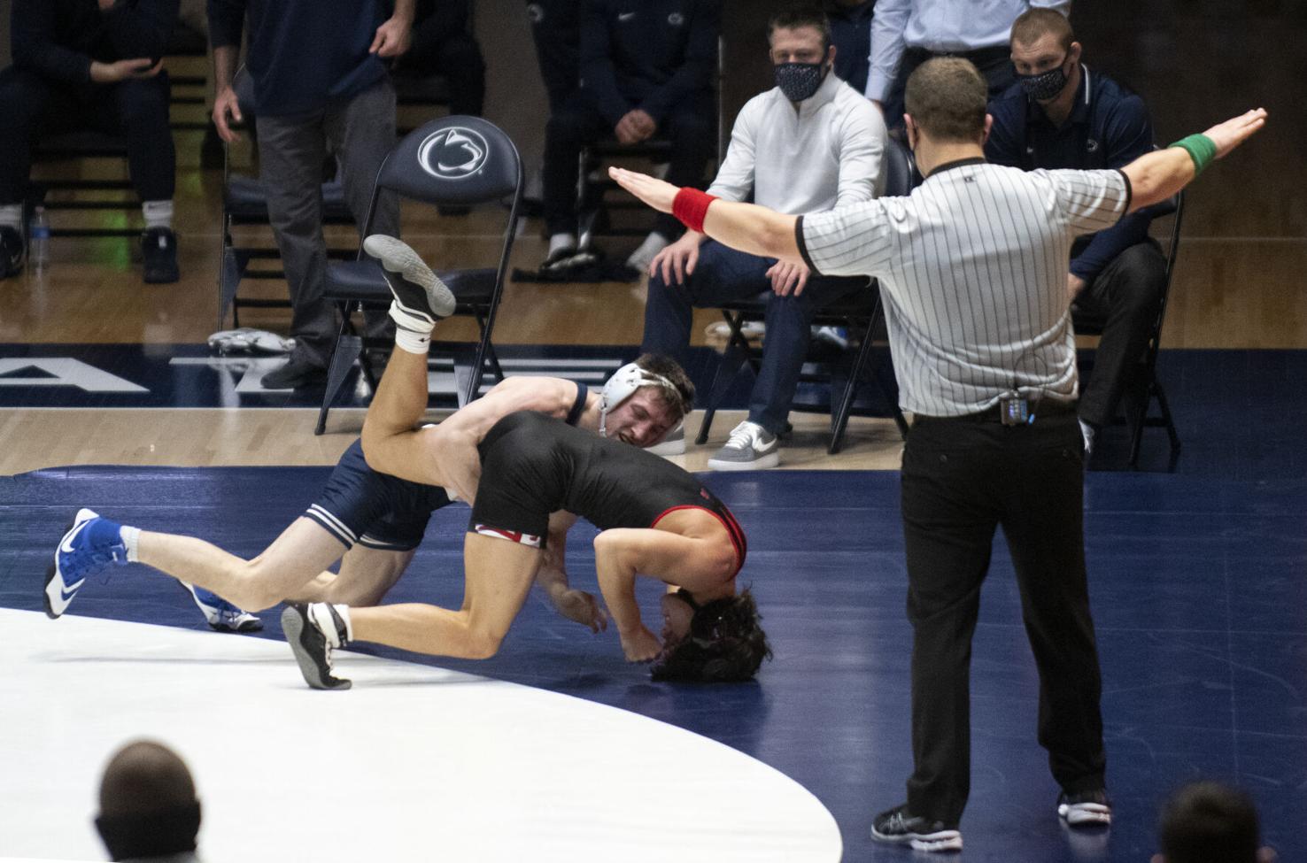 How Penn State wrestling’s coaching staff adds an edge in tough moments