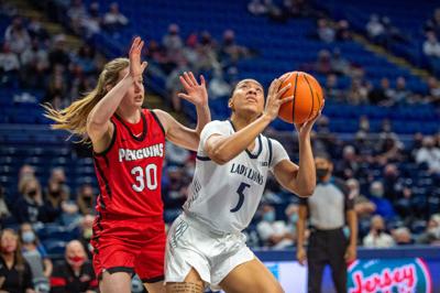 Penn State women's basketball guard Leilani Kapinus (5) prepares to shoot basket against Youngstown State