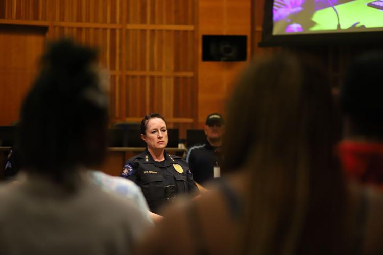 Protesters for Kilyn Lewis take over Aurora council meeting Local