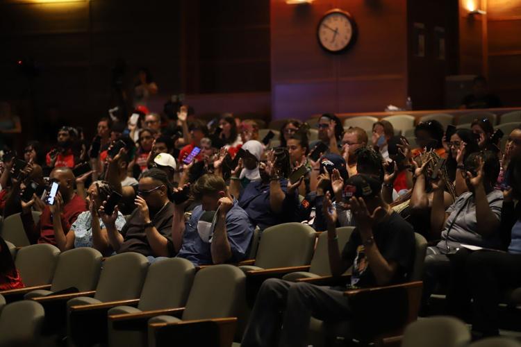 Protesters for Kilyn Lewis take over Aurora council meeting Local