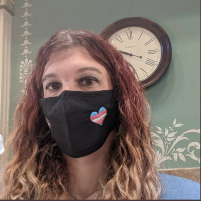 Rep. Brianna Titone, wearing a mask with the trans flag colors, March 31, 2021