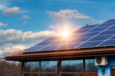 Solar panel on a red roof