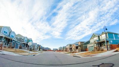 Driving through new residential neighborhood in suburbia