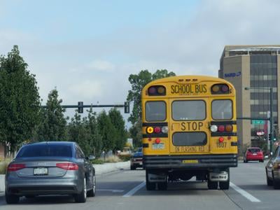 a public schools bus on the road in Denver