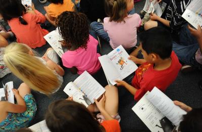 kids reading books.jpg