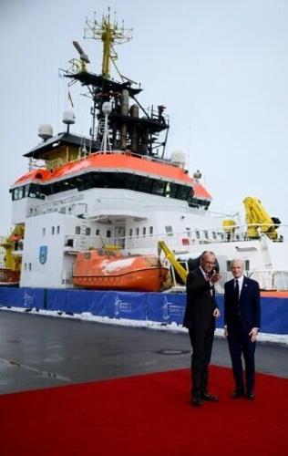 German Chancellor Friedrich Merz welcomes Norway's Prime Minister Jonas Gahr Store at the port of Hamburg, northern Germany