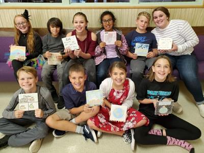 B4 HRVCC kids make tiles for warming shelter project.jpg
