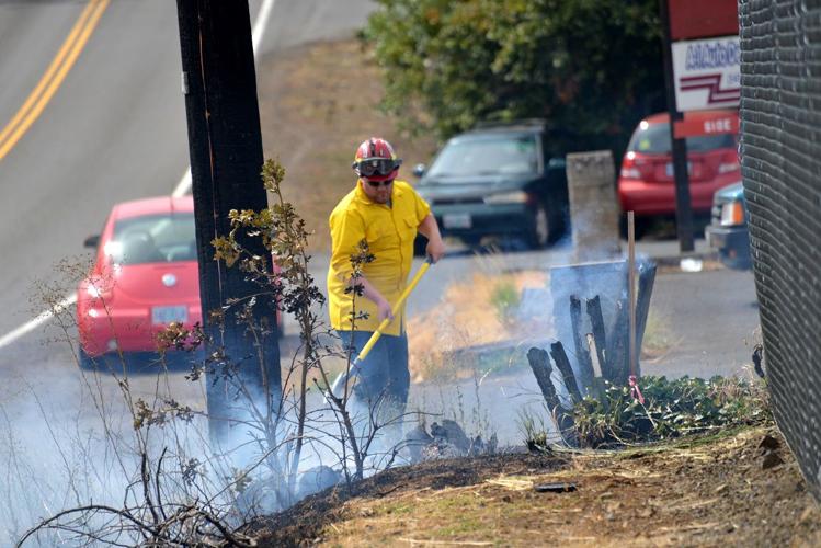 Power line fire doused Monday