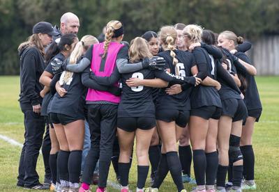 The Dalles girls soccer team huddles up before the game against Rainier/Clatskanie/Knappa on Nov. 4.  Zach Thummel photo