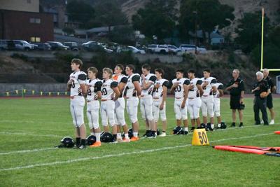 Sherman players line up for the national anthem earlier this year  Chelsea Marr photo