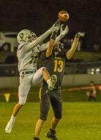 Putnam pulls away late, tops Riverhawks, 55-41