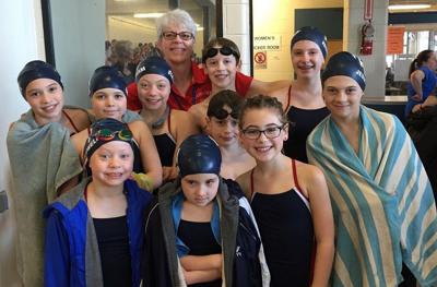 Local swimmers close out winter season with strong performances