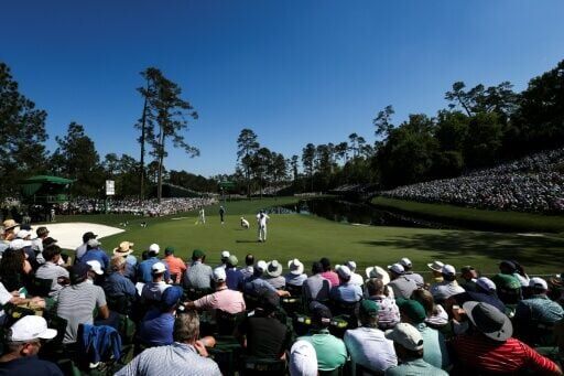 World number one Scottie Scheffler lines up a putt on the 16th green in the third round of the Masters