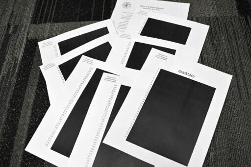 Redacted documents after the US Justice Department began releasing the long-awaited records from the investigation into the politically explosive case of convicted sex offender Jeffrey Epstein