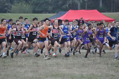 Columbia cross country runners take on the course in a meet earlier this year