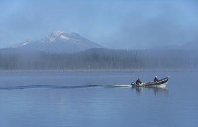 Day of rainbows on a Cascade lake