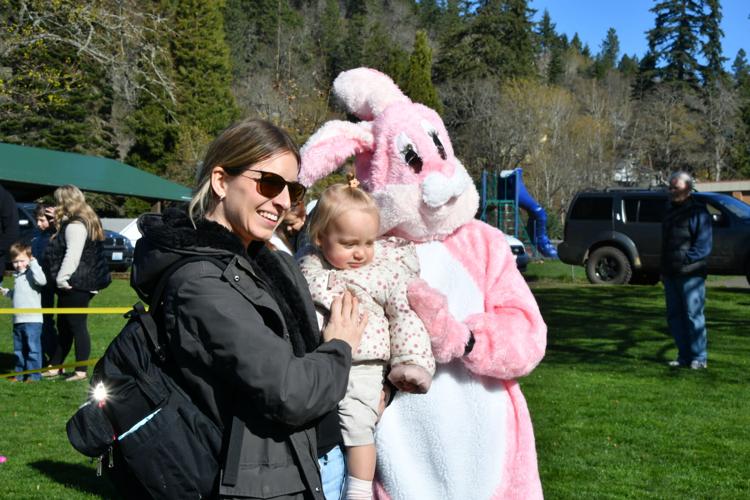 Rose Ruffing of Underwood with Nola 16 months and Easter Bunny.JPG