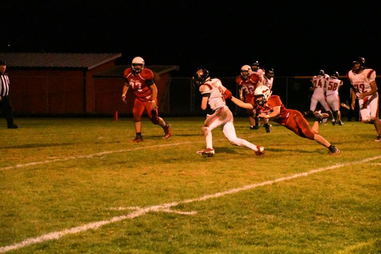 CHS FBall Sawyer Muehlbauer 82 WR reaches for Vancouver with 77 and 32 in backgroundDSC_4582.JPG